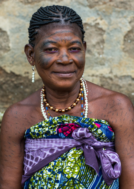 Benin, West Africa, Bopa, voodoo priestess with tattooed face during a ceremony