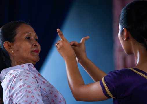 Cambodian dancer with her teacher during a training session of the National ballet, Phnom Penh province, Phnom Penh, Cambodia
