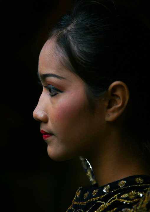 Side view of a cambodian dancer face during a training session of the National ballet, Phnom Penh province, Phnom Penh, Cambodia