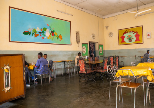 Eritrean men in a decorated restaurant, Semien-Keih-Bahri, Keren, Eritrea