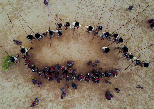 Aerial view of dimi ceremony in the Dassanech tribe to celebrate circumcision of teenagers, Omo Valley, Omorate, Ethiopia