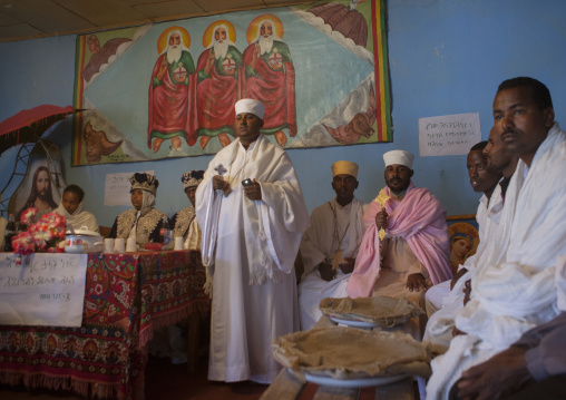 Lunch time during an Ethiopian wedding in an orthodox church, Zway, Ethiopia