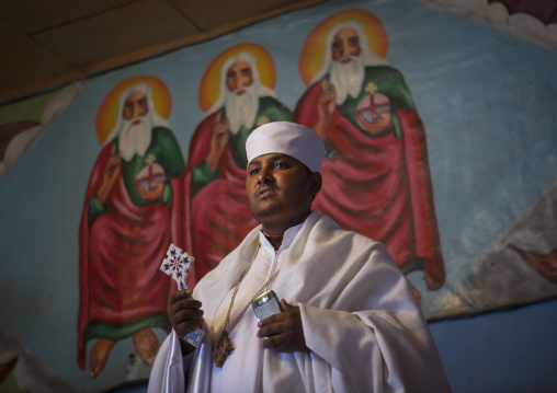 Priest singing during an Ethiopian wedding in an orthodox church, Zway, Ethiopia