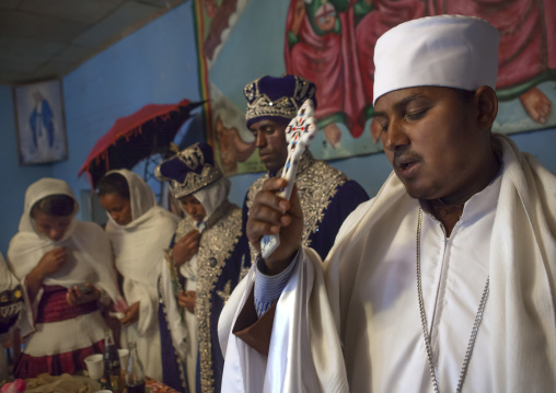 Priest singing during an Ethiopian wedding in an orthodox church, Zway, Ethiopia