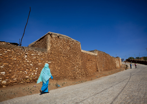 Blue-dressed Woman Passing By The Old Walls, Harar, Ethiopia