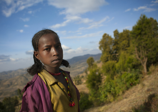 Portrait Of An Oromo Tribe Girl With Stranded Hair And Pearl Necklace, Dire Dawa, Ethiopia