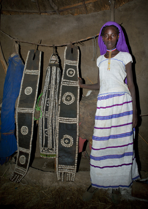 Karrayyu Tribe Teenage Girl Showing The Decoration Inside Her House, Metahara, Ethiopia