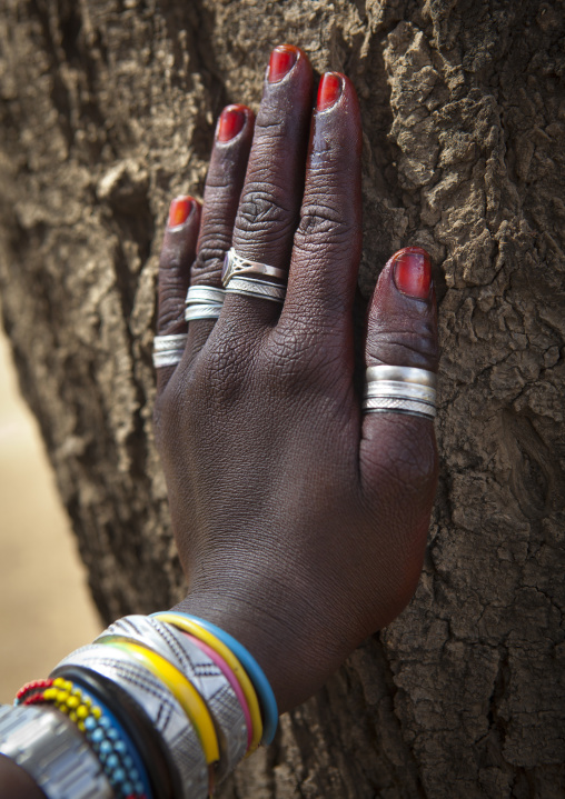 Close Up On The Hand Of A Karrayyu Tribe Woman With Bracelets, Rings And Red Tainted Finger Nails, At Gadaaa Ceremony, Metahara, Ethiopia