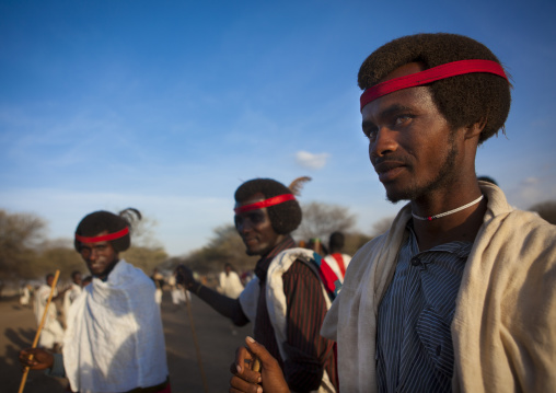 Karrayyu Tribe Men With Gunfura Hairstyle And Red Hairband During Gadaaa Ceremony, Metahara, Ethiopia