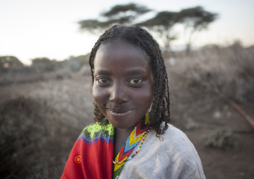 Portrait Of A Smiling Karrayyu Tribe Girl In The Country Side, Metehara, Ethiopia