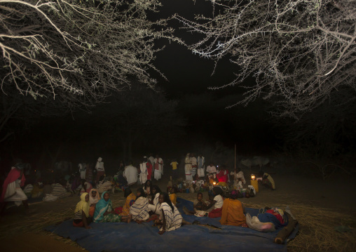 Night Shot Of Karrayyu Tribe People Resting During Gadaaa Ceremony, Metahara, Ethiopia