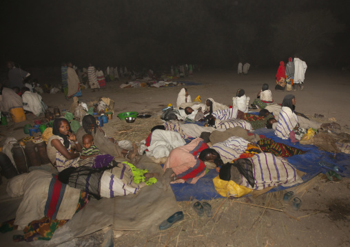 Night Shot Of Karrayyu Tribe Women And Children Sleeping On The Floor And Waiting For The Opening Of The Gadaaa Ceremony, Metahara, Ethiopia