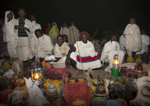Night Shot Of Karrayyu Tribe People Gathered Around The Gifts Offered To The Karrayyu Tribe Families For The Gadaaa Ceremony, Metahara, Ethiopia