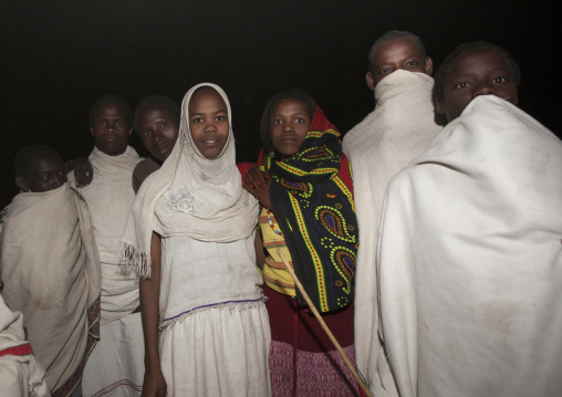 Night Shot Of A Group Of Smiling Karrayyu Tribe Teenage Boys And Girls During Gadaaa Ceremony, Metahara, Ethiopia