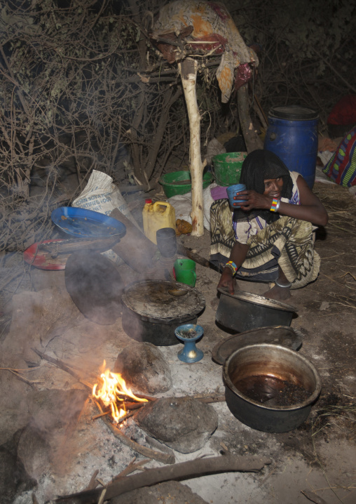 Karrayyu Tribe Woman Cooking Food In A House Built For The Gadaaa Ceremony, Metahara, Ethiopia