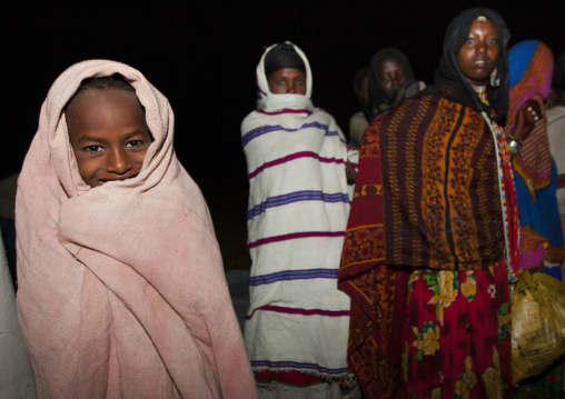 Night Shot Of Karrayyu Tribe Teenage Girls In Colourful Clothes During Gadaaa Ceremony, Metahara, Ethiopia