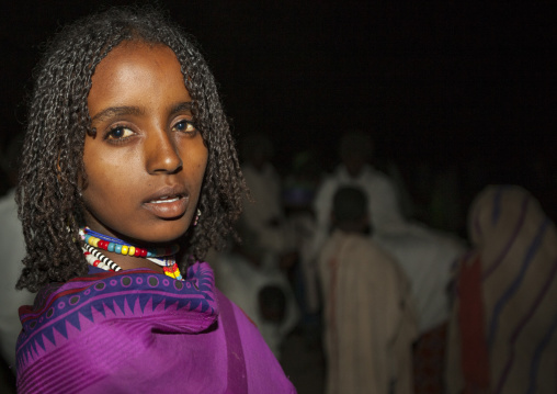 Karrayyu Tribe Girl With Stranded Hair, Colourful Necklace And Purple Scarf During Gadaaa Ceremony, Metahara, Ethiopia