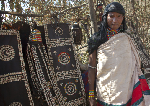 Karrayyu Tribe Woman Standing In The House Built For The Gadaaa Ceremony Decorated With Pieaces Of Leather Incrusted With Shells, Metehara, Ethiopia