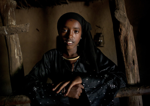 Portrait of a girl inside her tukul in alaba, Ethiopia