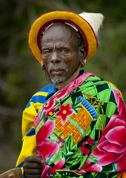 Portrait Of A Hamer Tribe Senior Man With Colorful Clothes At Bull Jumping Ceremony, Omo Valley, Ethiopia