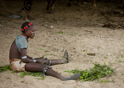 Young Hamer Tribe Woman Resting During Bull Leaping Ceremony, Omo Valley, Ethiopia