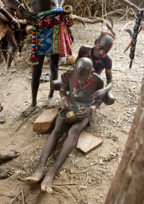Whippers Putting Make Up During Bull Jumping Ceremony In Hamer Tribe, Turmi, Omo Valley, Ethiopia