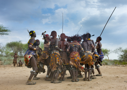 Hamer Tribe Women Celebrating Bull Jumping Ceremony By Dancing In Round, Omo Valley, Ethiopia