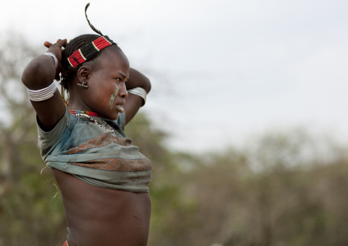 Hamer Tribe Woman With Hands Behind Her Head Celebrating Bull Jumping Ceremony, Omo Valley, Ethiopia
