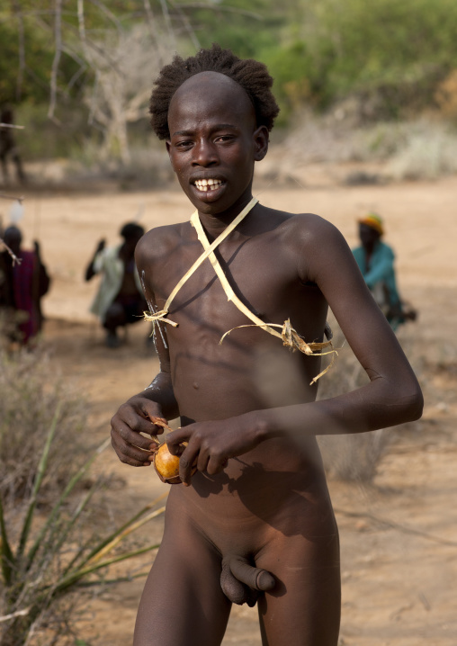 Hamer Tribe Teenage Boy Ready To Jump During Bull Leaping Ceremony, Omo Valley, Ethiopia