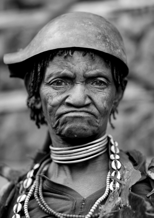 Portrait Of Senior Banna Tribe Woman With Calabash On Head In Key Afer, Omo Valley, Ethiopia