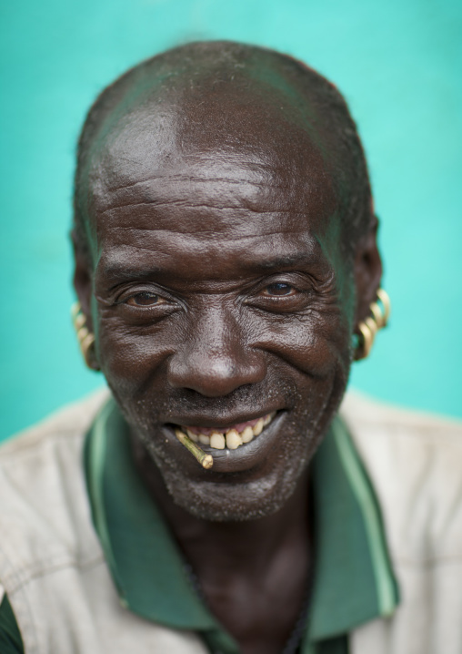 Senior Bana Man With Siwak Stick And Earrings Portrait Omo Valley Ethiopia