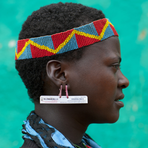 Recycled Materials Earring  And Headband Profile Of Young Fashionable Banna Woman Ethiopia
