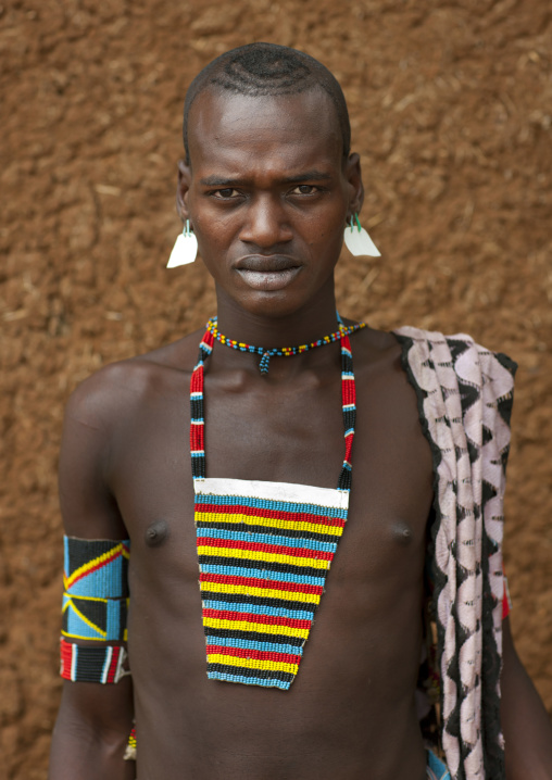Fashionable Mixed Styles Tribal Western Young Banna Man Portrait In Key Afer Omo Valley Ethiopia