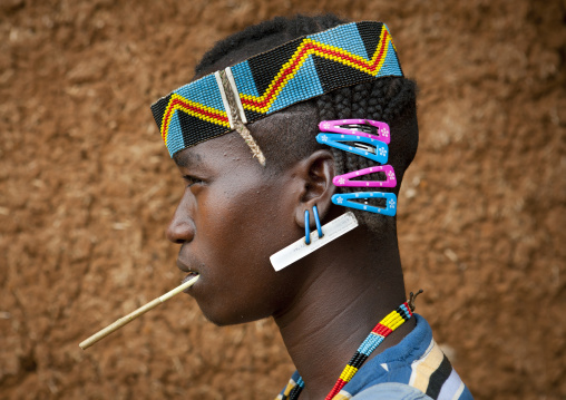 Fashionable Mixed Styles Tribal Western Young Banna Man Portrait In Key Afer Omo Valley Ethiopia