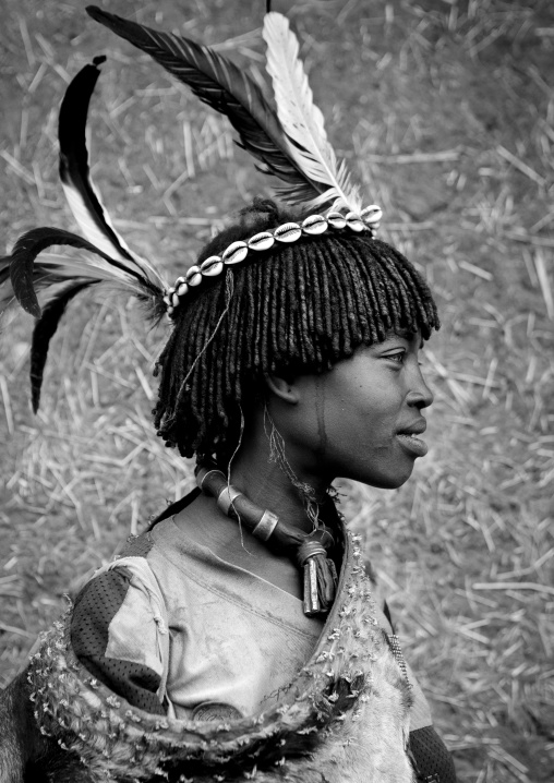 Portrait Of Bana Woman With Feathers And Skin Key Afer Omo Valley Ethiopia