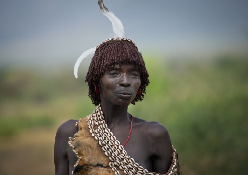 Banna Woman With Feather Shell And Skin Portrait Ethiopia