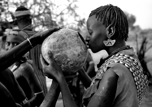 Banna Woman Drinking From Calabash During Bull Jumping Ceremony Ethiopia