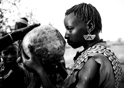 Banna Woman Drinking From Calabash During Bull Jumping Ceremony Ethiopia