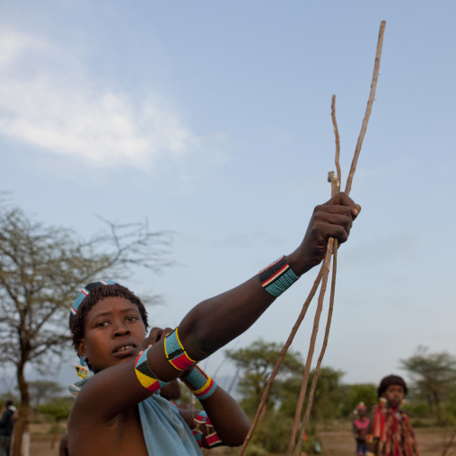 Banna Woman Raising Hand With Whips Bull Jumping Ceremony Omo Valley Ethiopia