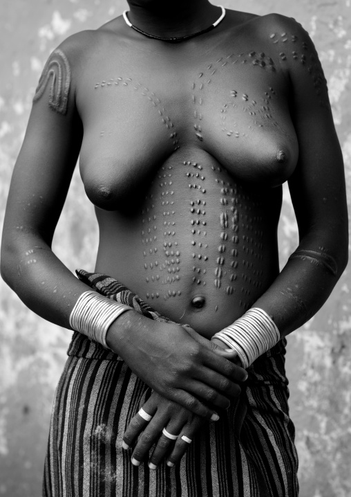 Naked Breasts Bodi  Woman Breasts And Shoulders With Scarified Skin Hana Mursi Village Omo Valley Ethiopia