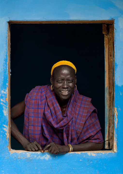 Smiling Bodi Woman In The Frame Of A Window Blue Wall Hana Mursi Village Omo Valley Ethiopia