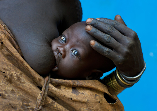 Baby Suckling His Bodi Mother With Hand On Head Hana Mursi Village Omo Valley Ethiopia