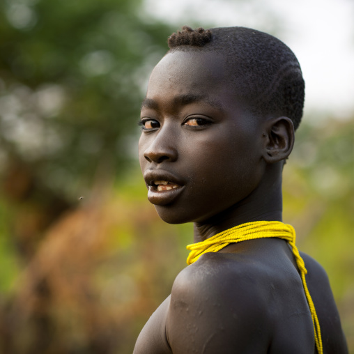 Bodi Teenage Boy Portrait With Yellow Necklace Omo Valley Ethiopia