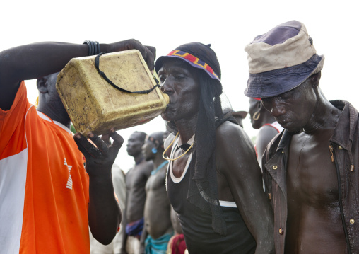 Bodi Man Drinking Alcohol From Yellow Jerrican Kael New Year Ceremony Omo Valley Ethiopia