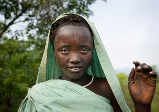 Bodi Teenage Girl With Turquoise Veil Waving Hand Kael New Year Ceremony Omo Valley Ethiopia