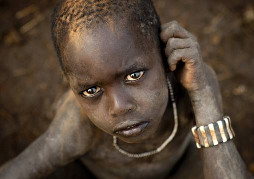 Portrait Of Concerned Look Little Bodi  Boy At Kael New Year Ceremony Omo Valley Ethiopia
