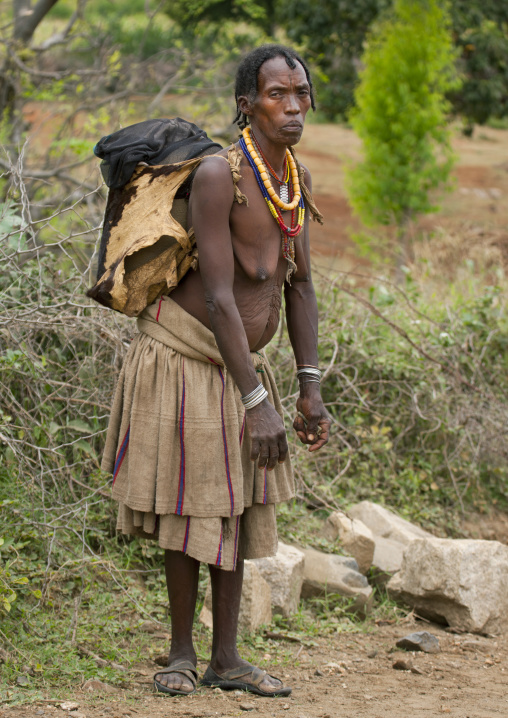 Senior Konso Woman Carrying Load On Her Back Omo Valley Ethiopia