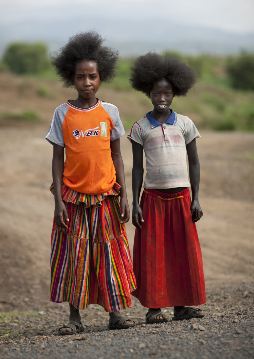 Two Konso Hairy Girls With Mixed Traditional Western Style Clothes Ethiopia