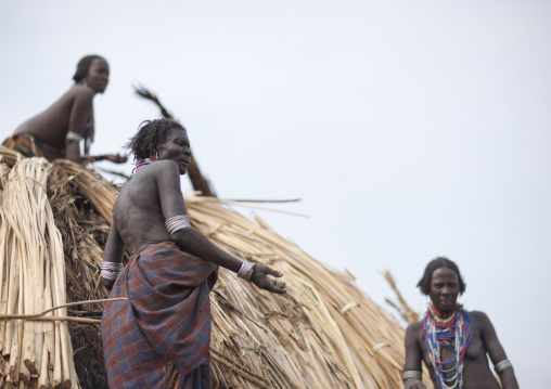 Arbore Tribe Women Making A Thatch Hut Ethiopia