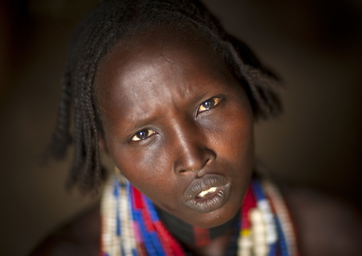 Portrait Of Beautiful Erbore Tribe Woman Wearing Beaded Necklace,  Omo Valley, Ethiopia